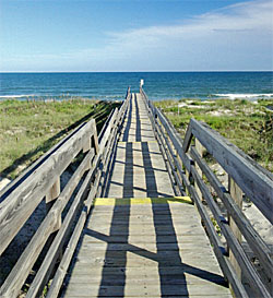 a walkway stretches toward the ocean in North Litchfield